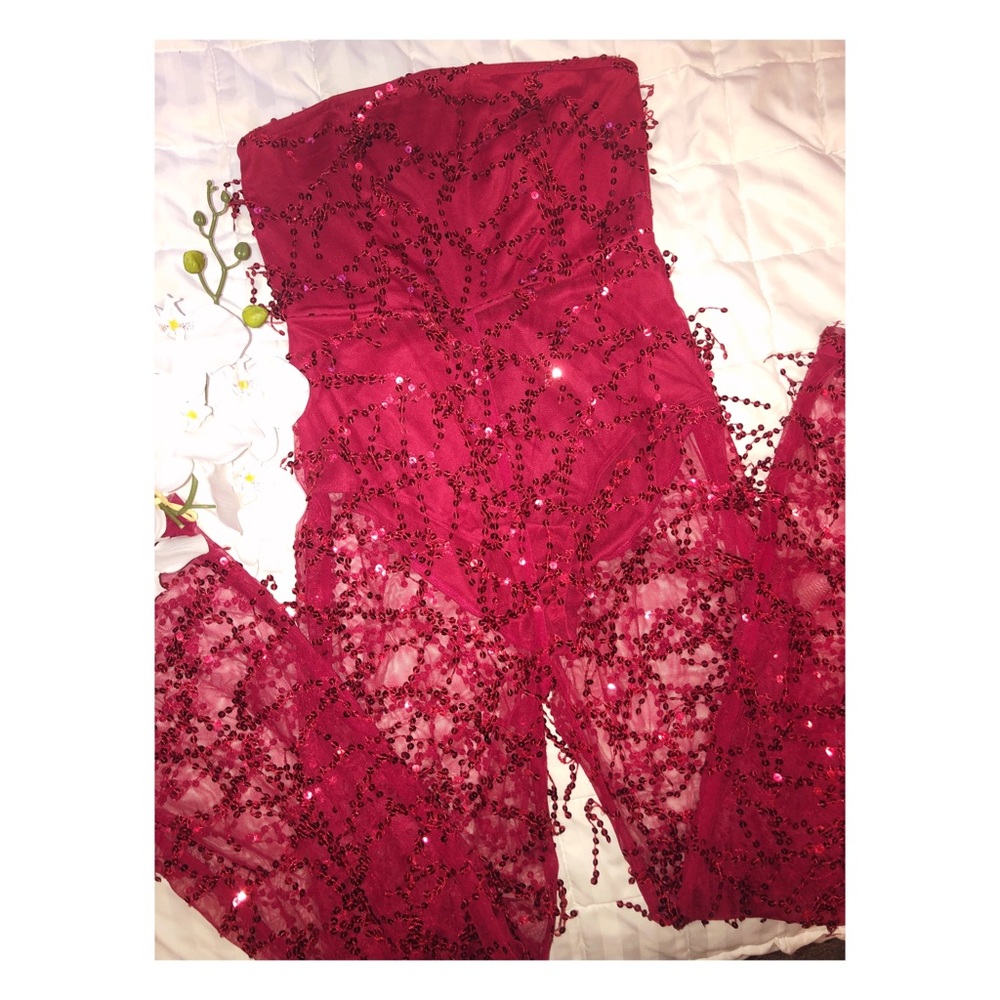 prettylittlething flashy red sequin jumpsuit.